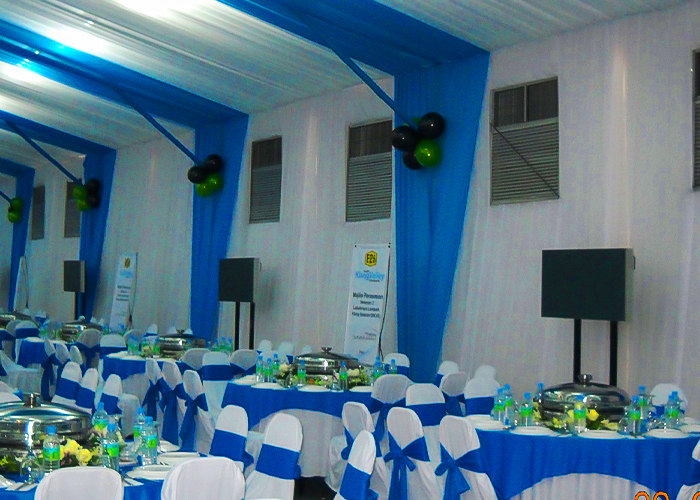 A display of TK Rentals’ 10HP Air Cooled Self-Contained air cond rental units in an indoor event setting.