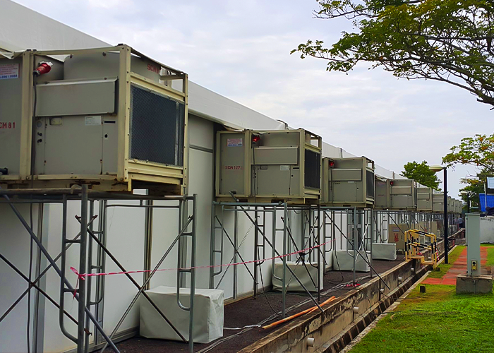 A display of TK Rentals’ 10HP Air Cooled Self-Contained air cond rental units in an outdoor setting.