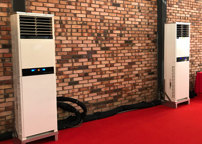 A display of TK Rentals’ 5HP Floor Standing air cond rental units at an event.