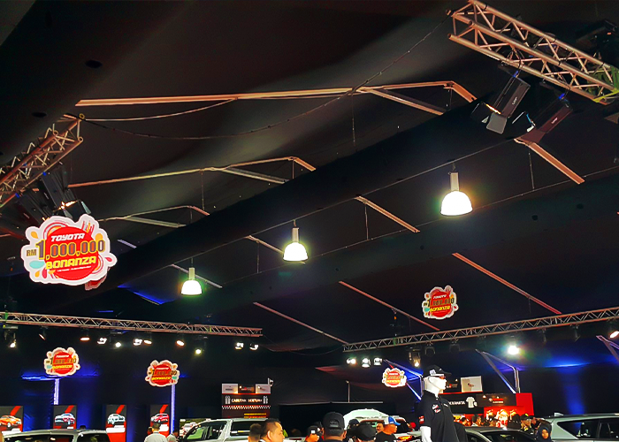 A display of TK Rentals’ Black Fabric Ducting Air Cond rental system units in an indoor setting.