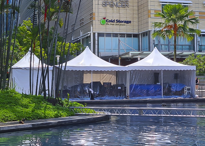 A frontal shot of a Canopy Tent rental unit in an outdoor setting.