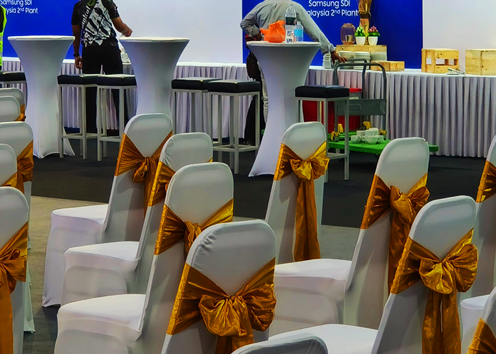 TK Rentals’ Tables and Chairs equipment rental in display.