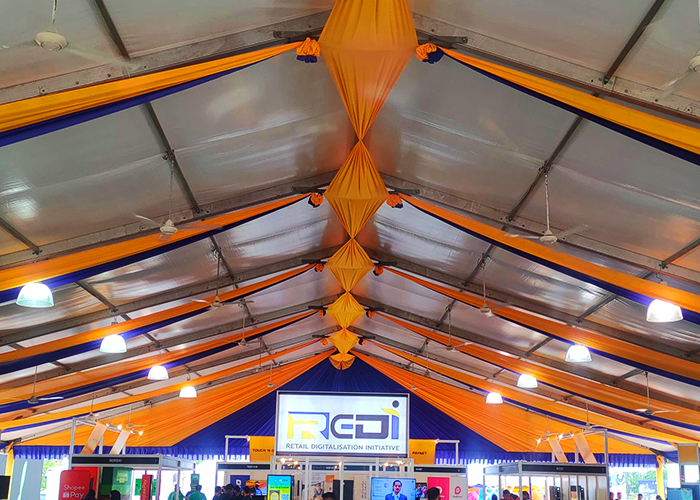 TK Rentals’ Tent Scallop, Highbay Light & Ceiling Fan equipment rental in display.